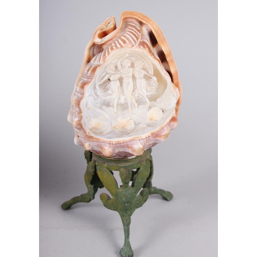 196 - A shell cameo, depicting The Three Graces, on metal stand, 7 1/4