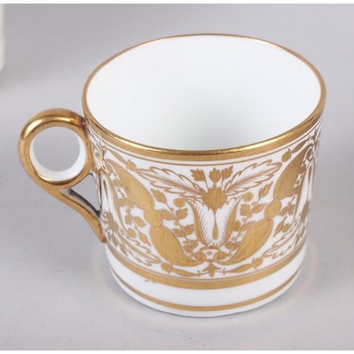 23 - A 19th century Minton bone china gilt decorated coffee can with faux Sevres mark, a Goss tyg and a 1... 