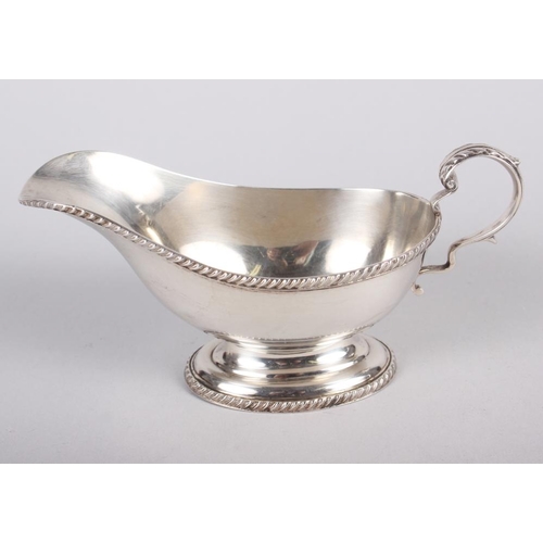 278 - A silver sauce boat with gadrooned borders, 5.7oz troy approx