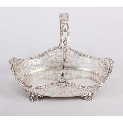 280 - A James Dixon & Son silver swing handle bread basket with pierced decoration, on four scrolled feet,... 