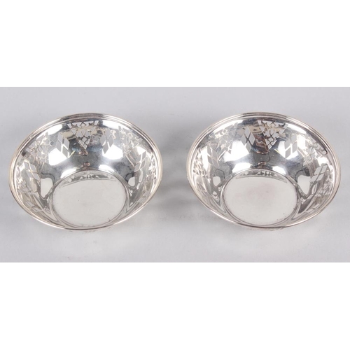 283 - A pair of silver bonbon dishes with pierced decoration, 4.2oz troy approx