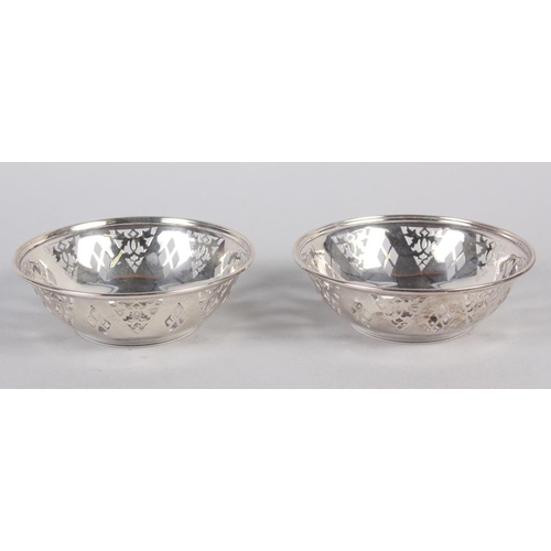 283 - A pair of silver bonbon dishes with pierced decoration, 4.2oz troy approx