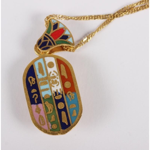 313 - A yellow metal fine link chain, stamped 750, and an Egyptian yellow metal enamel and diamond pendant... 