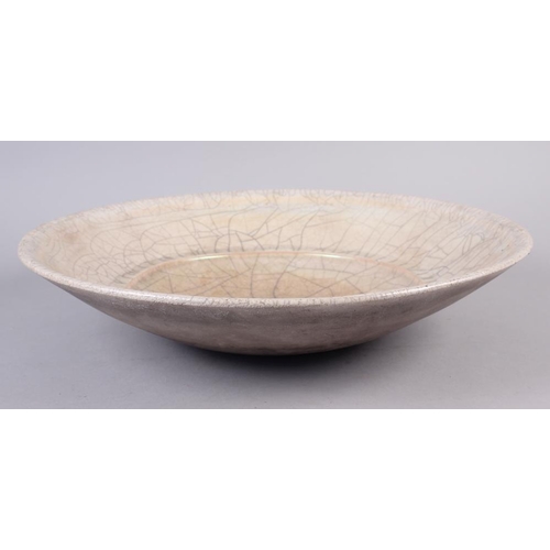 35 - A John Dunn Raku pearlescent shallow bowl, 17 1/2