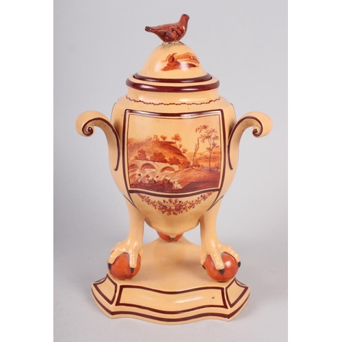 39 - A late 18th century English pottery pastel jar and cover with landscape panels, on three claw and ba... 