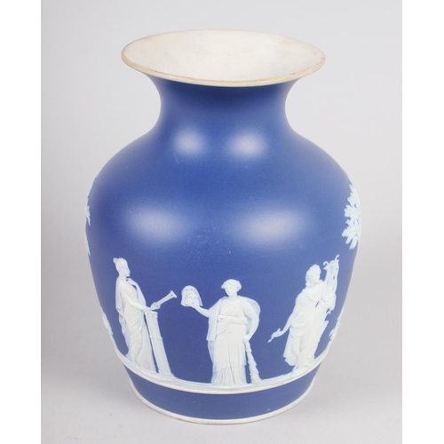 41 - A 19th century Wedgwood blue jasperware vase with classical figure decoration, 6 3/4