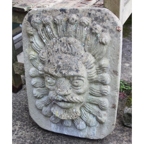 631 - A cast stone water fountain, in the form of a stylised lion mask, 16 3/4