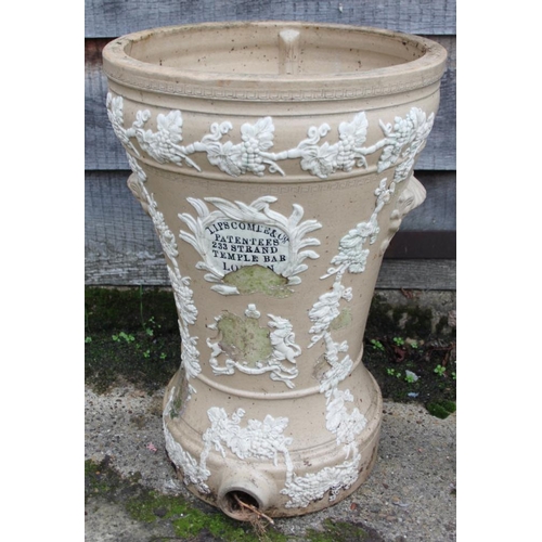 644 - A ceramic water purifier with relief decoration (damages)