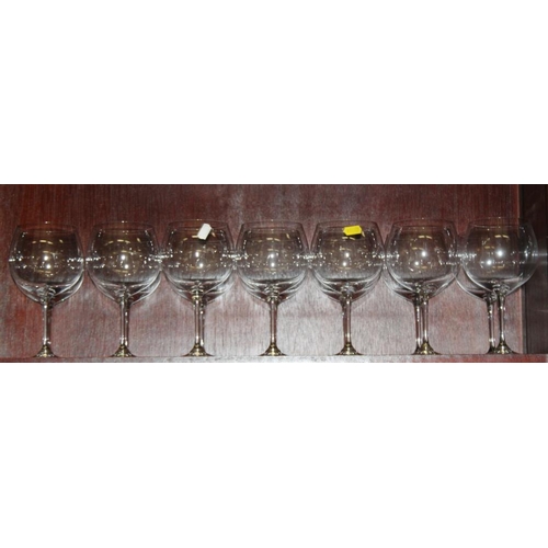 78 - Fourteen Riedel pedestal wine glasses