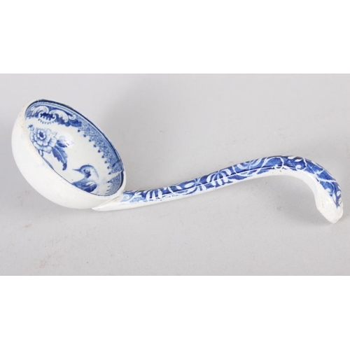 9 - A 19th century blue and white ladle, decorated birds and flowers, 7