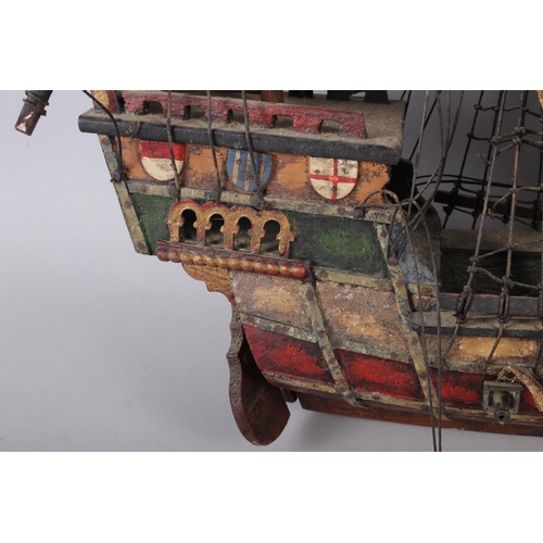 141 - A painted wood model galleon, Santa Maria, 31