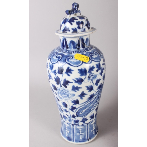 98 - A Chinese blue and white porcelain ginger jar, now converted to a table lamp, a similar cylinder vas... 