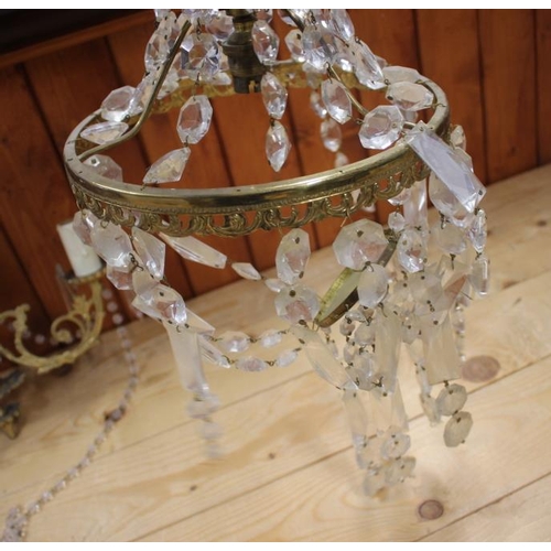 208 - A gilt metal and crystal drop chandelier and two others