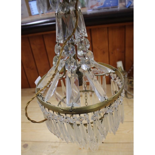 208 - A gilt metal and crystal drop chandelier and two others