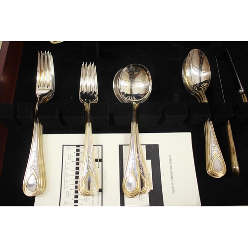 230 - A Carrs plated and parcel gilt table service for four in fitted canteen