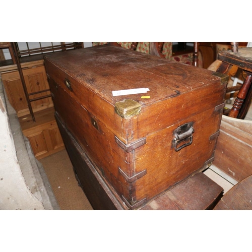 647 - A teak and brass bound trunk 37