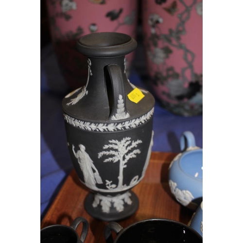 69 - A Wedgwood black jasperware two-handled vase, 8