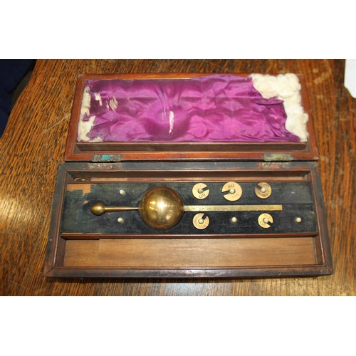 132 - An early 20th century copper coal helmet and a Sikes Hydrometer, in wooden case
COLLECT