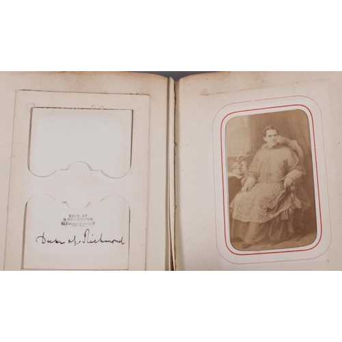 196 - A Victorian carte de visite album, containing approximately thirty photographs of nobility, etc