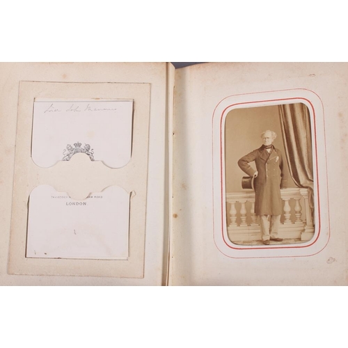 196 - A Victorian carte de visite album, containing approximately thirty photographs of nobility, etc