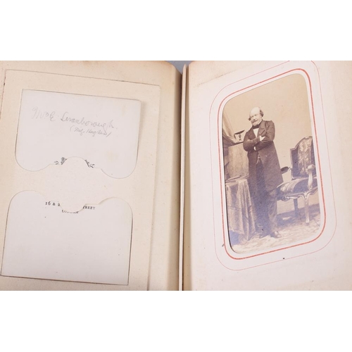 196 - A Victorian carte de visite album, containing approximately thirty photographs of nobility, etc