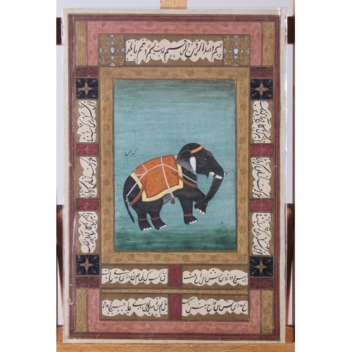 351 - A 19th century Indian watercolour of a caparisoned elephant with Arabic calligraphy border, 13 1/2