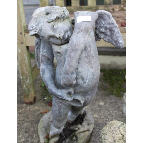 582 - A lead model of cherub, 21 1/2