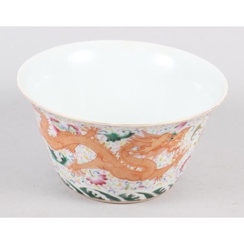 97 - A Chinese bowl with flared rim, decorated dragons and flowers with seal mark to base
COLLECT