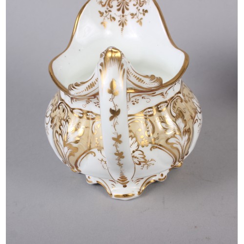 9 - A 19th century bone china bulbous vase, decorated with panels of flower on a blue and gilt ground, 8... 