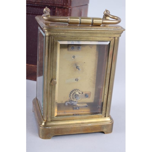 113 - A French five-glass carriage clock with white enamel dial and Roman numerals, retailed by Howell & J... 