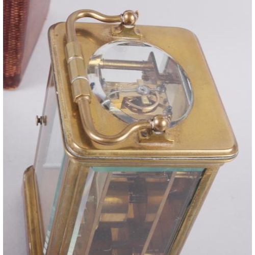 113 - A French five-glass carriage clock with white enamel dial and Roman numerals, retailed by Howell & J... 