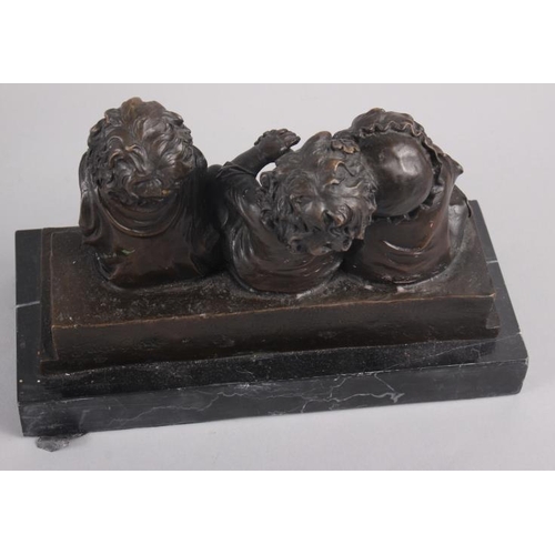 132 - Juan Clara: a bronzed figure group of three children sitting, 7