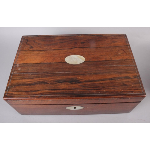 143 - A rosewood writing box with mother-of-pearl inset, 13 3/4