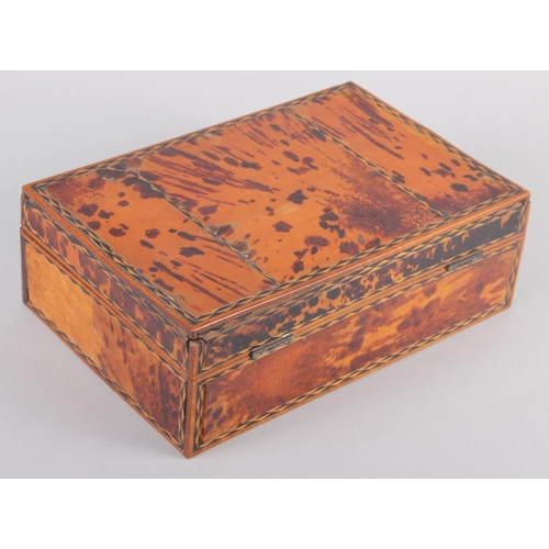 147 - A tortoiseshell and marquetry decorated two-section workbox, 11 3/4