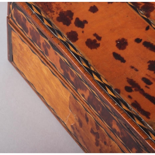 147 - A tortoiseshell and marquetry decorated two-section workbox, 11 3/4