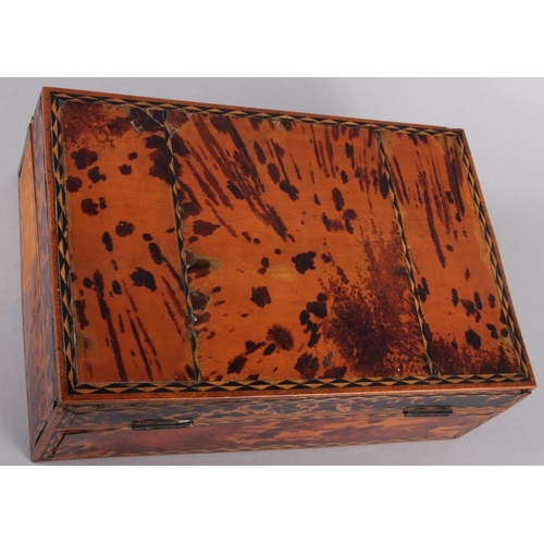 147 - A tortoiseshell and marquetry decorated two-section workbox, 11 3/4