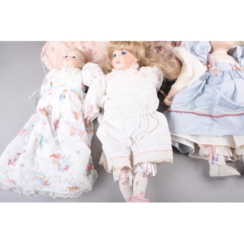 155 - Seven dolls, including a limited edition Hamilton Collection porcelain head doll, 