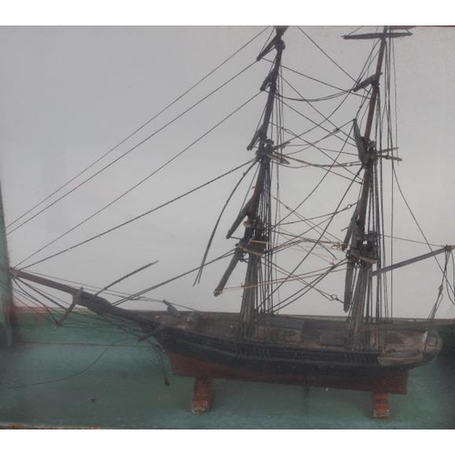 180 - An early 19th century model of a two-mast square-rigger, in an oak and four-glass case, 12 1/2