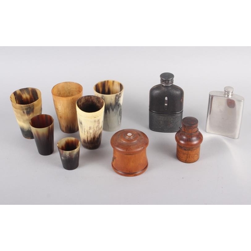 181 - Six horn beakers, a boxwood cased ink bottle, 3 1/2