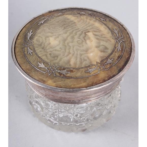 275 - A silver vesta case, inlaid with hardstone shamrock (losses), a silver dressing table jar lid, a cut... 