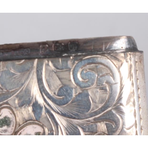 275 - A silver vesta case, inlaid with hardstone shamrock (losses), a silver dressing table jar lid, a cut... 