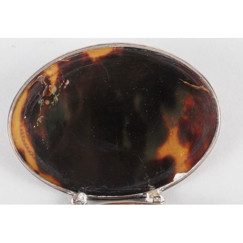 277 - An 18th century white metal and tortoiseshell oval snuffbox with pique decorated lid