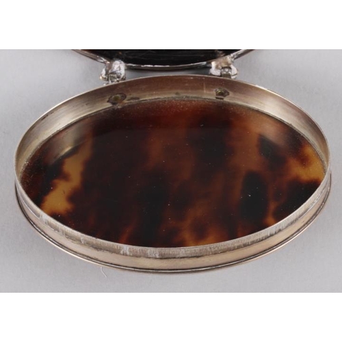 277 - An 18th century white metal and tortoiseshell oval snuffbox with pique decorated lid