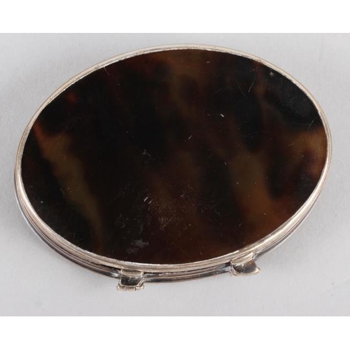 277 - An 18th century white metal and tortoiseshell oval snuffbox with pique decorated lid