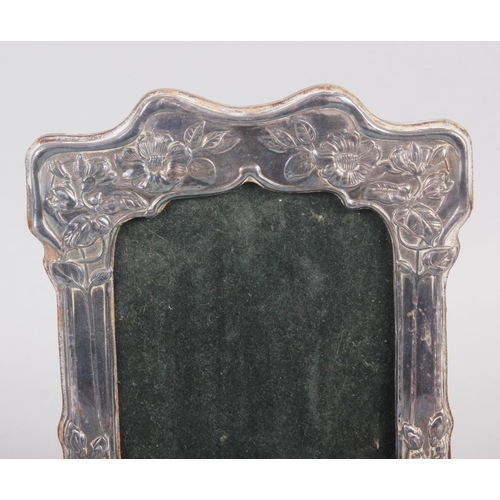 283 - A silver Art Nouveau style picture frame, 8