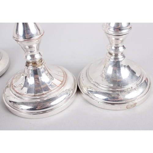 289 - Three pairs of filled silver candlesticks, tallest 7 1/4