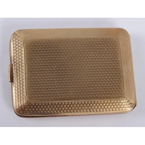 296 - A 9ct gold match book holder with all-over engine turned decoration, 33.3g