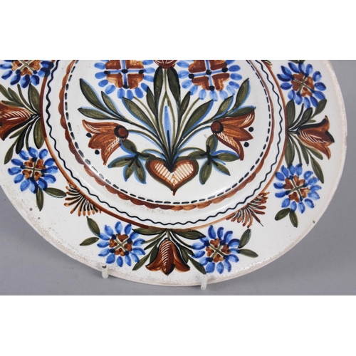 4 - A Thun type wall plate with floral decoration, 9 3/4