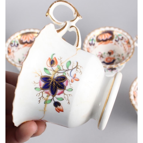 44 - A 19th century English porcelain part tea service for six, in the Imari palette with gilt highlights