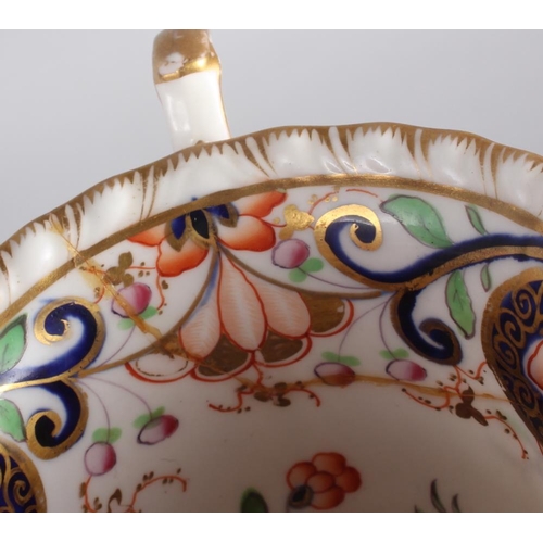 44 - A 19th century English porcelain part tea service for six, in the Imari palette with gilt highlights